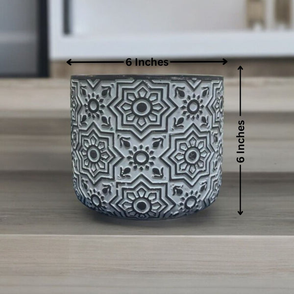 Cement designer planter with round shape and smooth finish