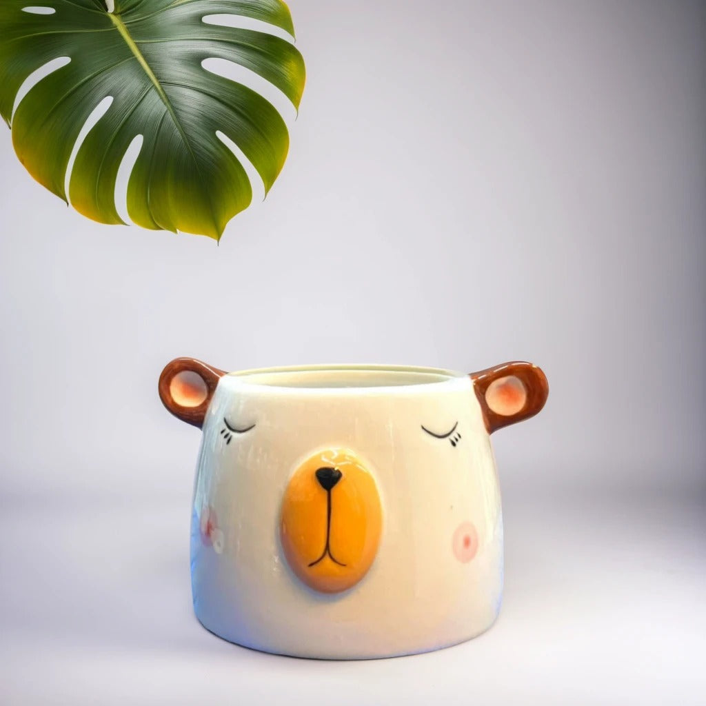 Sleeping Bear Face Shape Ceramic Planter in white and yellow